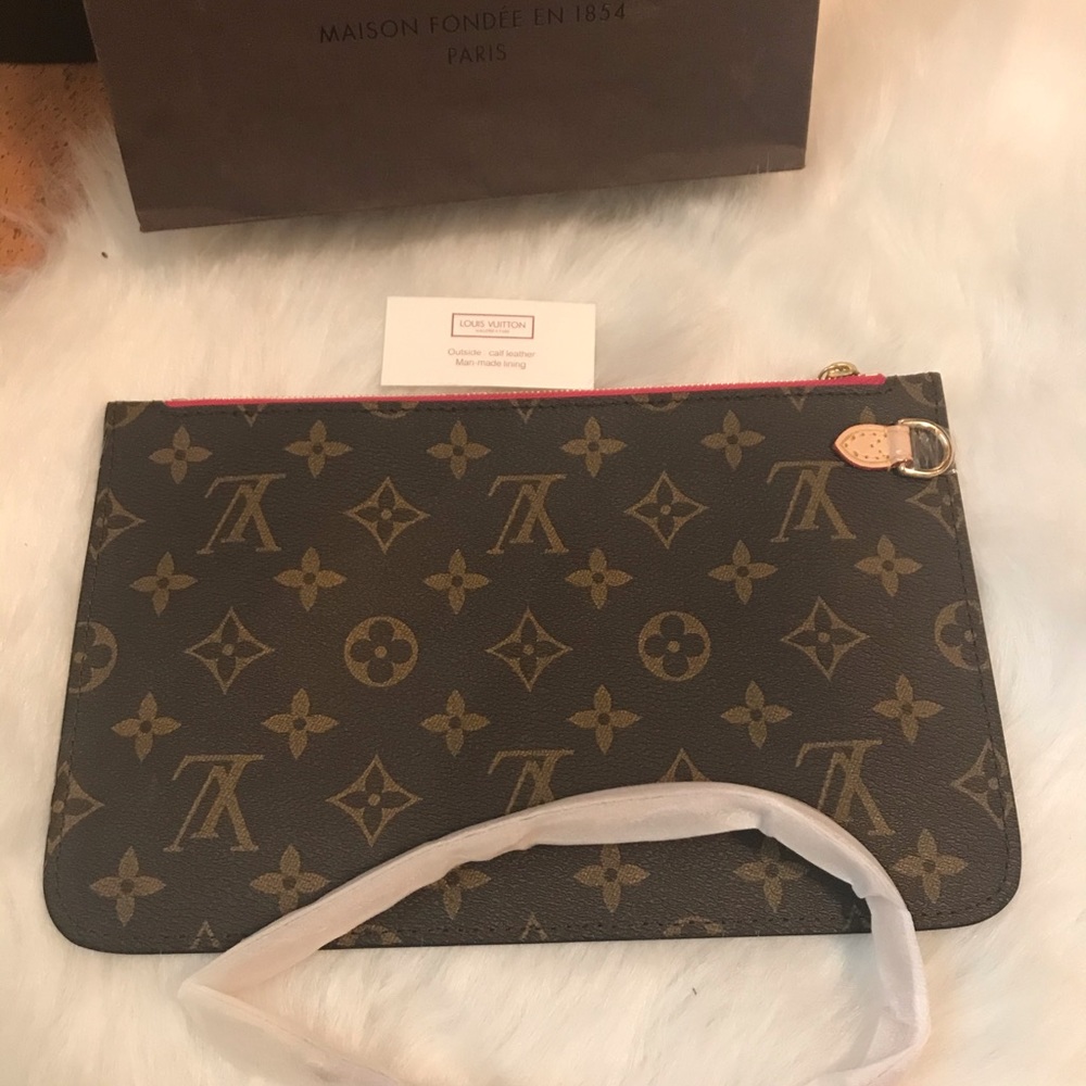 Louis Vuitton wristlet from the never full bag